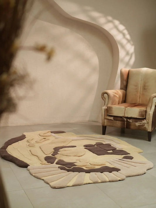 Beige and brown hand-tufted wool carpet with abstract high-low design in a living room