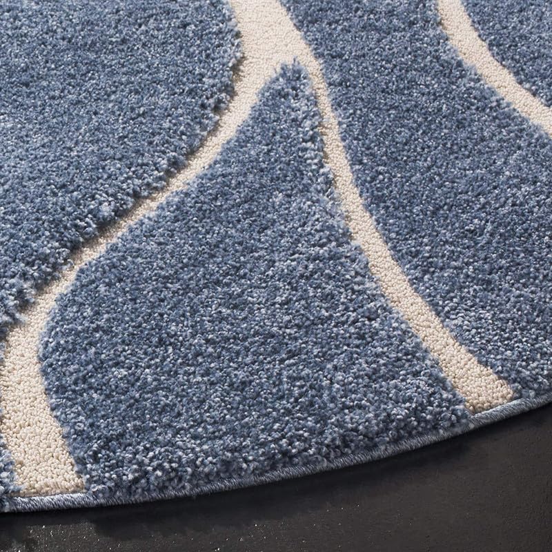 Blue and white shaggy carpet showing textured pile and flowing white line design