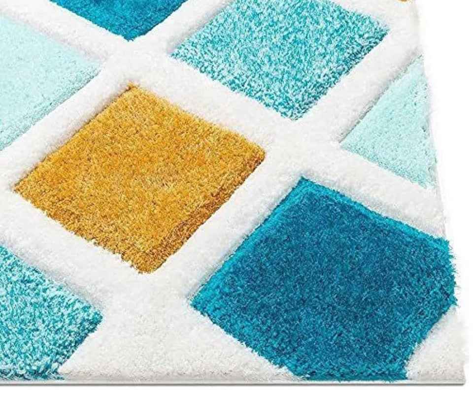 Close-up of blue and yellow shaggy rug with mustard and aqua diamond pattern