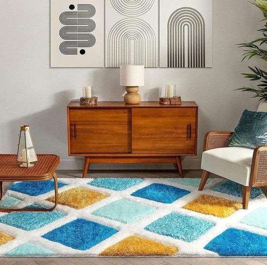 Blue and yellow rug with geometric diamond pattern styled in a modern living room
