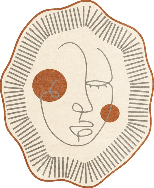 Ivory and rust rug with abstract face design and organic irregular shape