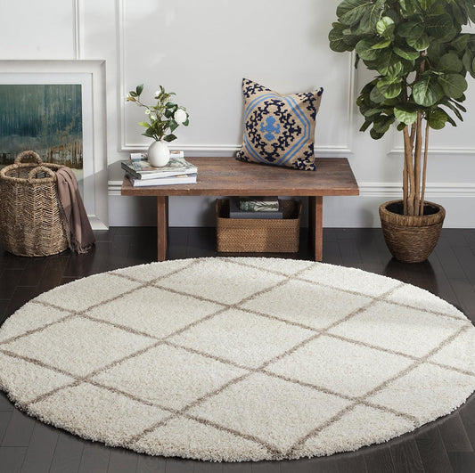 Ivory and beige round trellis shaggy rug styled in a modern sitting area