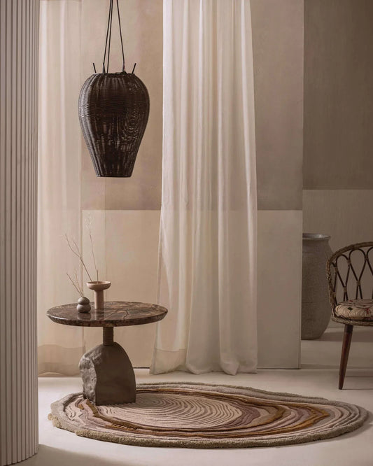Minimalist beige brown wool rug with organic contour design in a modern interior