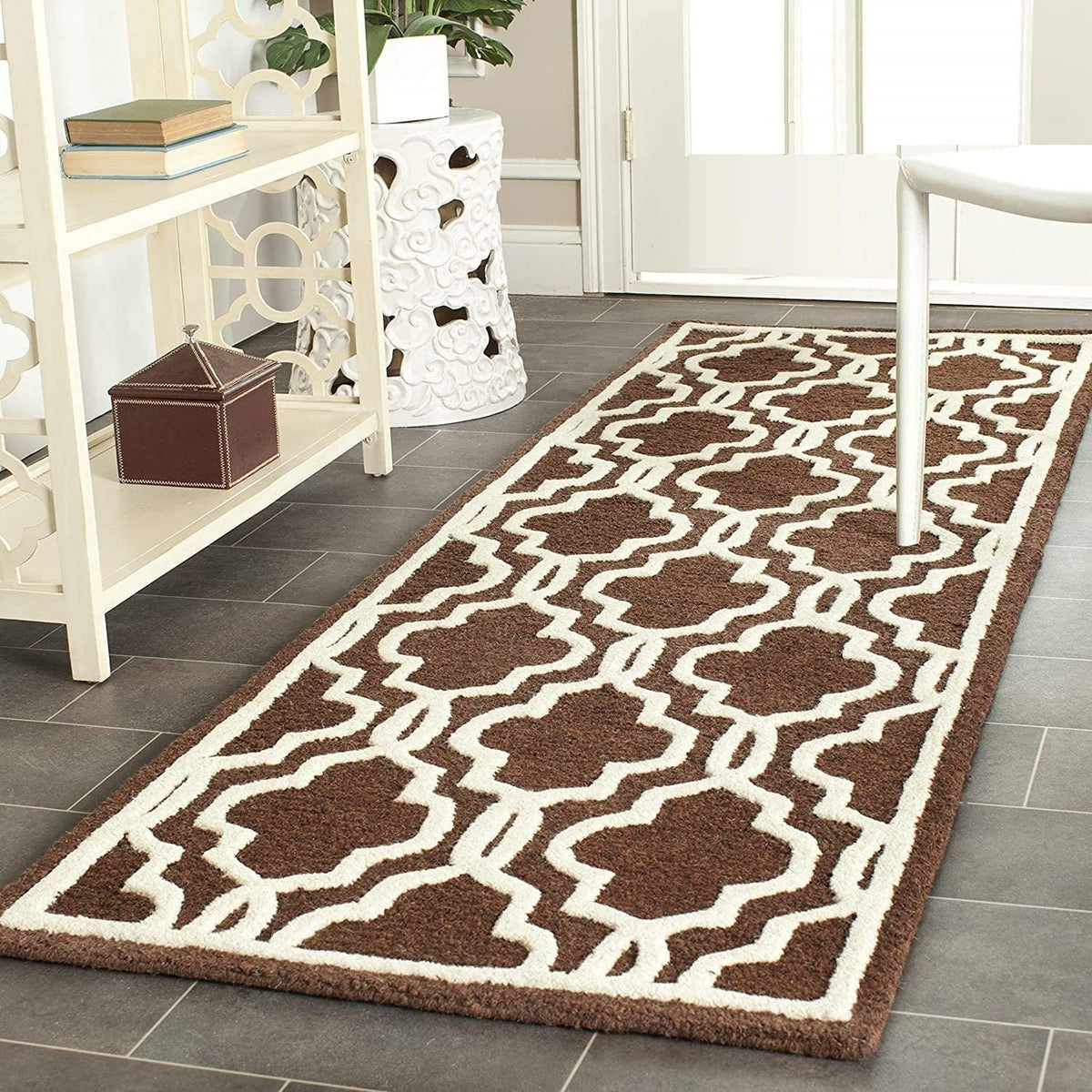 Parpuse brown and cream geometric runner rug styled in a contemporary interior
