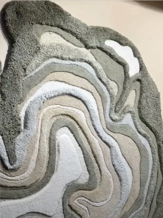 Pastel green and beige abstract carpet with raised flowing texture