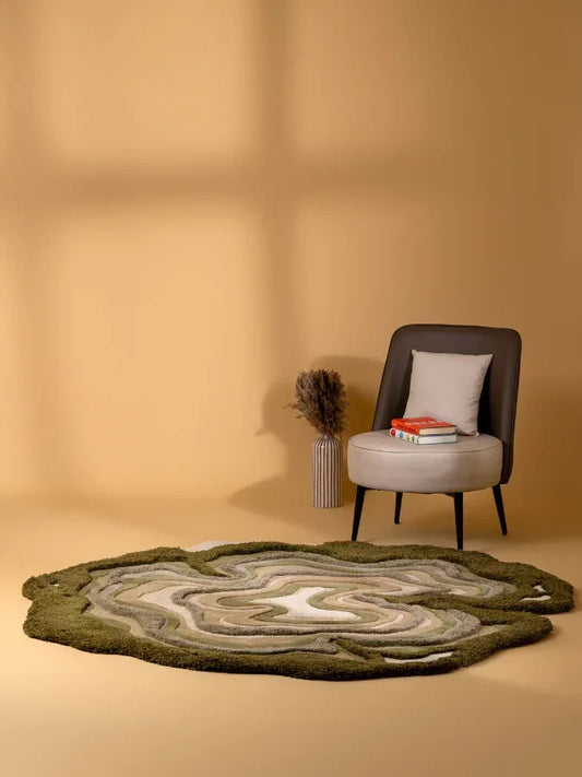 Pastel green carpet with beige abstract design styled in a modern living room