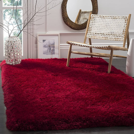 Red carpet with solid deep red shaggy texture styled in a modern living room