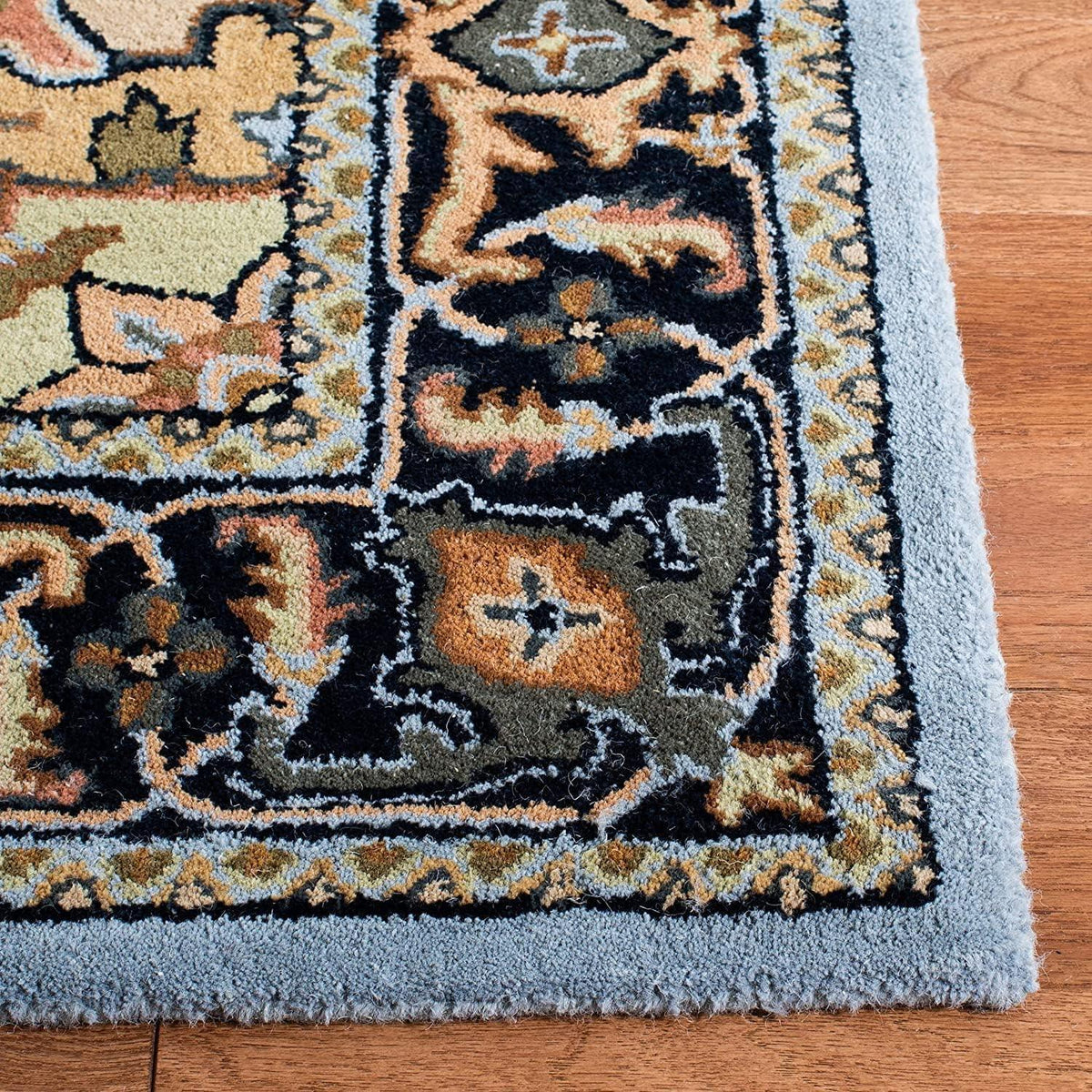 Tabriz Persian rug close-up showing detailed floral medallion and ornamental pattern